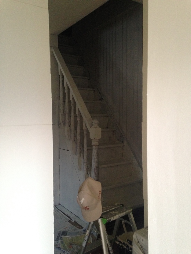 Staircase half-painted and looking super ugly